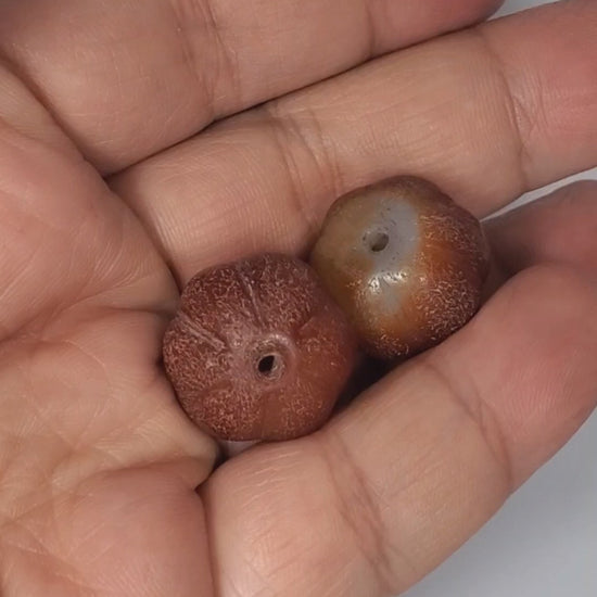 Ac-061126-PKP video rotation both beads, ribbed pumpkin carnelian pair 18.8×16.1mm & 19.1×16.2mm, unretouched footage