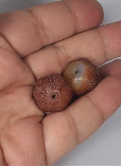 Ac-061126-PKP video rotation both beads, ribbed pumpkin carnelian pair 18.8×16.1mm & 19.1×16.2mm, unretouched footage