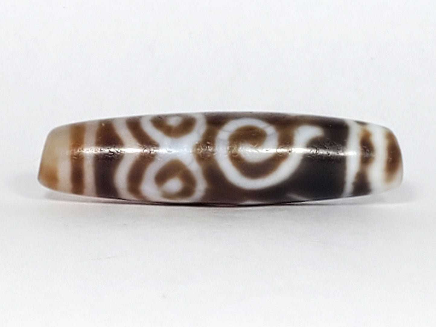 At-061926-PDEBS Face A close angle, fine age micro-cracking, cream-white scroll lines, unretouched