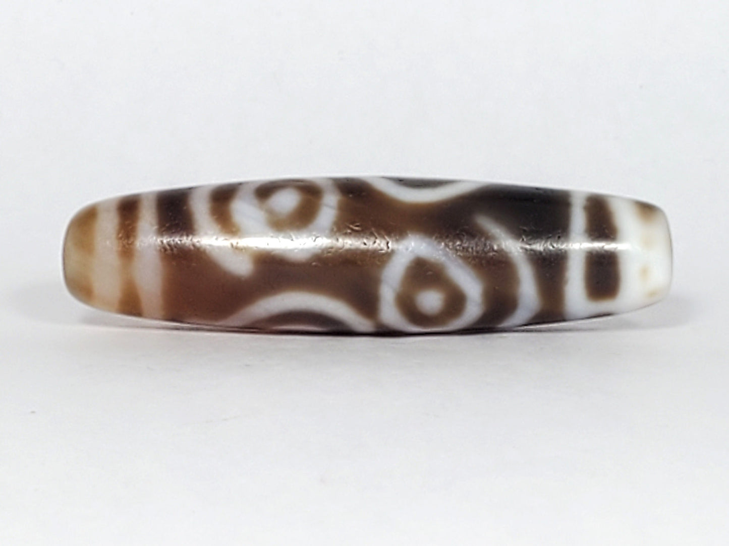 At-061926-PDEBS Face A close angle, fine age micro-cracking, cream-white scroll lines, unretouched