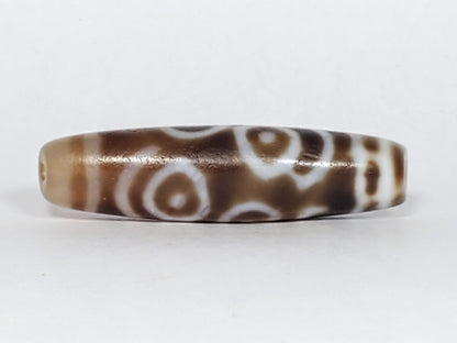 At-061926-PDEBS Face B close angle, semi-translucent glow visible, honey-tan end cap, unretouched