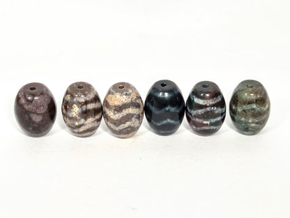 N-062626-6WDWBS clearance set six new wave dzi with bloodspots, front view, six distinct grounds, unretouched