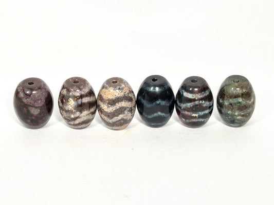 N-062626-6WDWBS clearance set six new wave dzi with bloodspots, front view, six distinct grounds, unretouched
