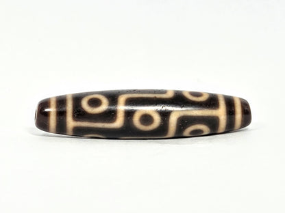 At-070626-9E antique nine eye dzi face C, deep dark brown agate, maze-like cream connector lines, unretouched