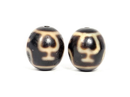 Treasure Vase Variant pair V-071426-TVV face B both beads — chalice reading, dark brown agate, 1980s Taiwan, unretouched.