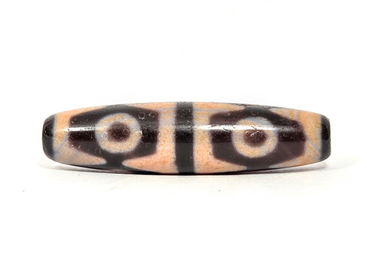 V-061026-6ETTBS face A, 49.1×12.3mm, cinnabar sandy-peach field, 2 eyes tiger tooth, dark end caps, unretouched