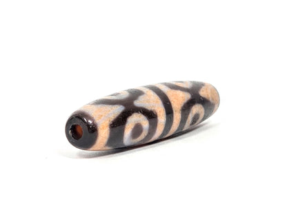 V-061026-6ETTBS opposite end, drill hole, tiger tooth motif on body, cinnabar-peach field visible, unretouched