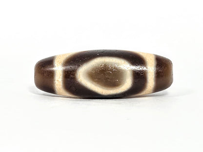 V-071126-HE primary face A, Heaven Earth teardrop oval, vintage Taiwan dzi 38.2×13.4mm, warm dark brown, 1980s, unretouched
