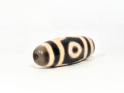 V-071126-3E opposite end view, warm grey end cap, second drill hole, cream and black banding on body, unretouched